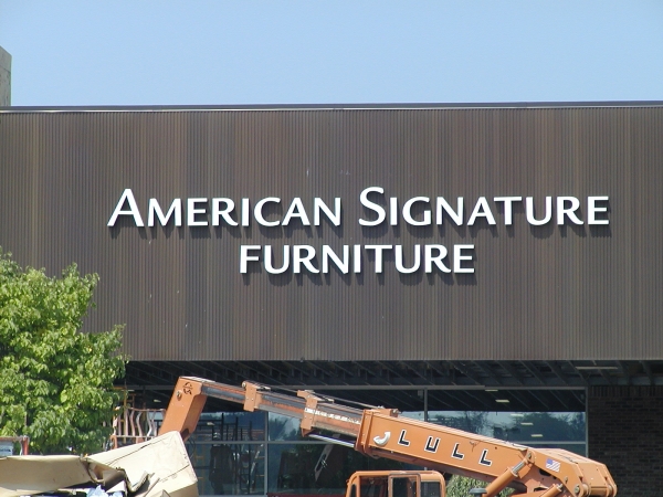 Furniture signs, business letter signs on building :: letter signs mounted to outside of building :: Liverpool, NY